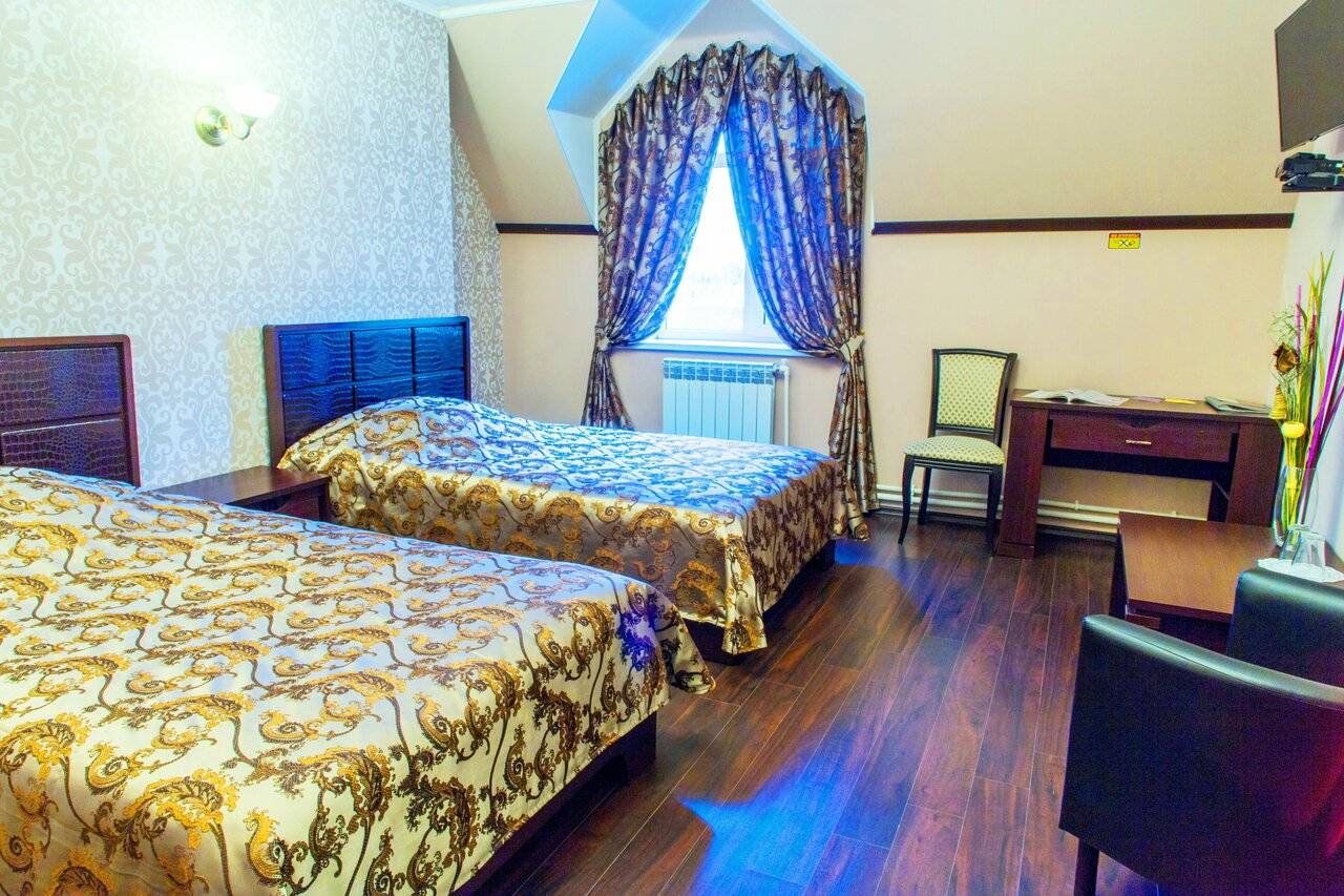 Трехместный номер Делюкс